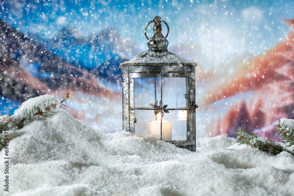Winter snow background with lamp and candle. Empty space for your product. Warm light of fire. Chrismtas time and blurred landscape of mountains. Cold december time and mockup for your decoration. Winter snow background with lamp and candle. Empty space for your product. Warm light of fire. Chrismtas time and blurred landscape of mountains. Cold december time and mockup for your decoration.