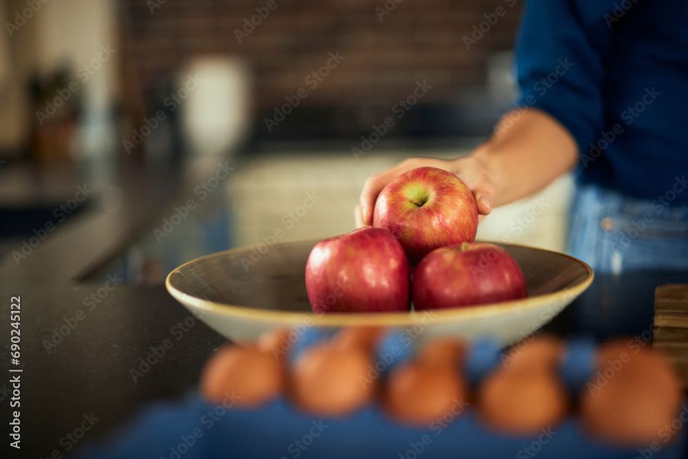 A close-up of a bowl full of apples, ready for making an apple pie. A close-up of a bowl full of apples, ready for making an apple pie.