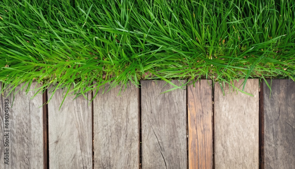 green grass with old rustic wooden floor top view green grass with old rustic wooden floor top view