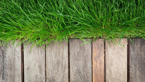 green grass with old rustic wooden floor top view