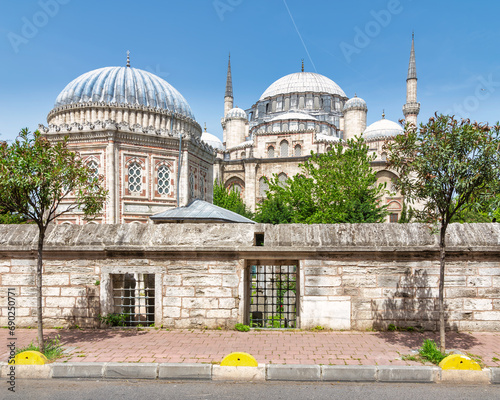 Sehzade Mehmet Turbesi or tomb, with Sehzade Mosque, or Sehzade Camii in the far end, located in the district of Fatih, on the third hill of Istanbul, Turkey photo