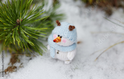 toy snowman on the snow © Александр Плисик