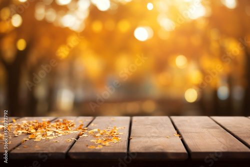 autumn leaves on the wooden background © Joun