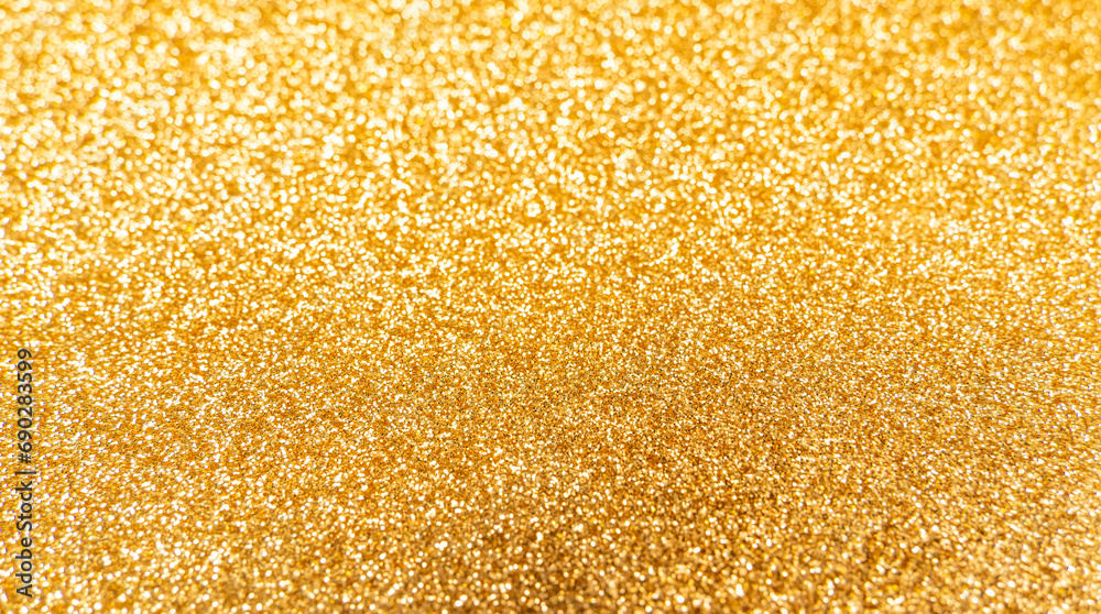 Golden glitter texture background with sequins and sparkles