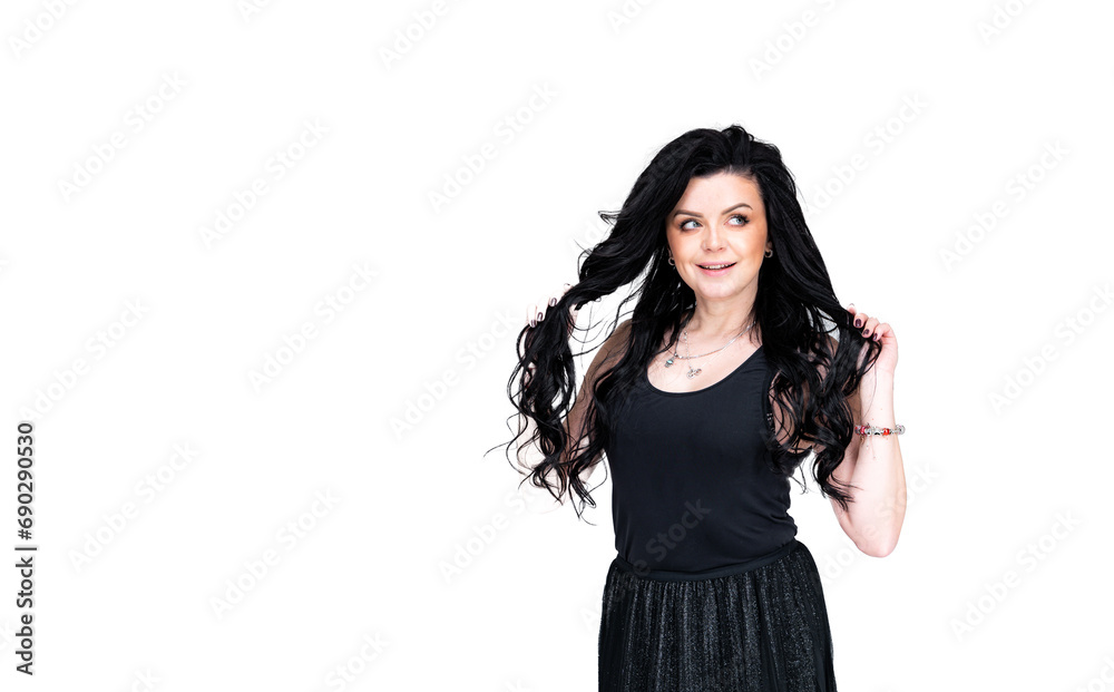 A woman in a black dress posing for a picture. A Woman in a Black Dress Posing for a Picture