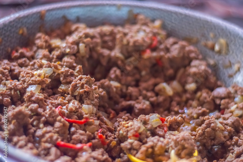 Ready-made ground beef seasoned with red peppers, meat texture