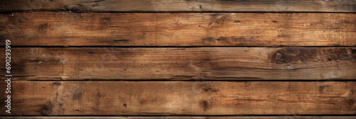 Old brown wood planks texture background, panoramic wide banner. Vintage wooden long horizontal boards. Theme of rustic design, nature, wallpaper, woodgrain, material