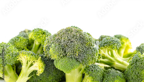 Broccoli florets at the bottom isolated on white background, cut out