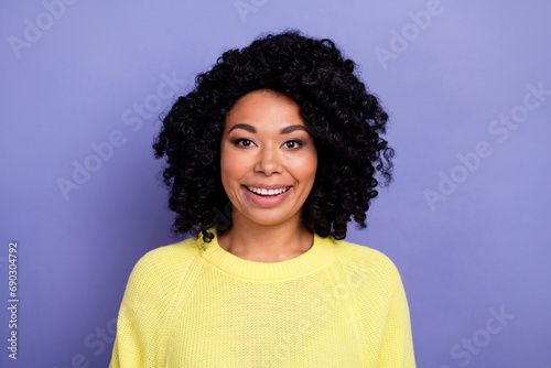 Photo portrait of pretty young girl look camera cheerful toothy smile wear trendy yellow outfit isolated on purple color background © deagreez