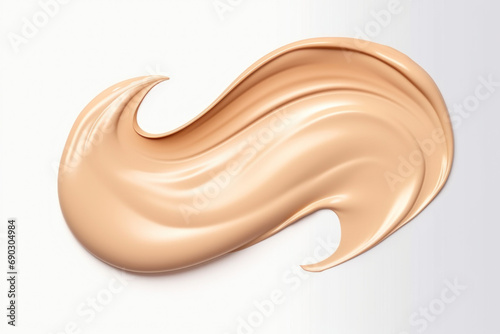 Swatch of liquid foundation makeup beige or nude color with smooth, silky texture. Cc cream smear, concealer drop, creamy beauty product sample, cosmetic tonal cream stroke
