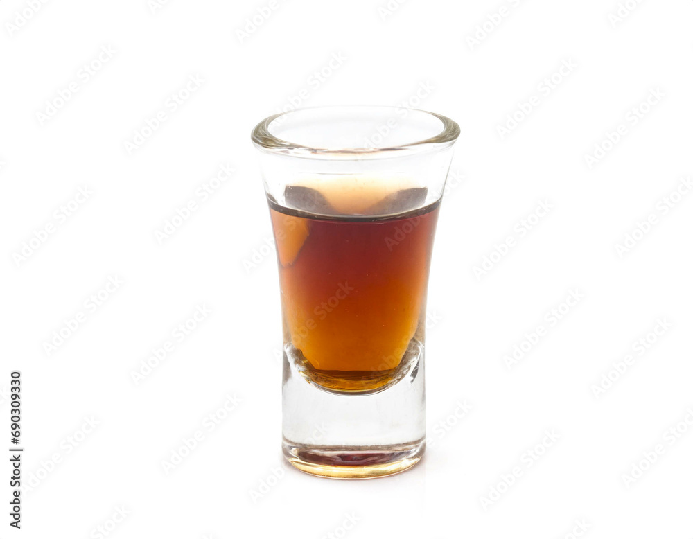 Herbal shot glass isolated on white background, cutout Herbal shot glass isolated on white background, cutout