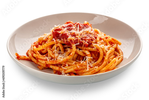 Bucatini pasta with tomato sauce and parmesan cheese in white plate isolated photo