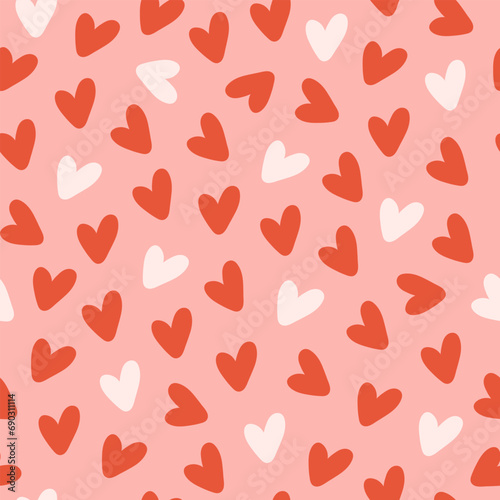 Minimalistic seamless pattern with small hearts on a pink background. Vector print for wallpaper, fabric, textile design, wrapping paper.