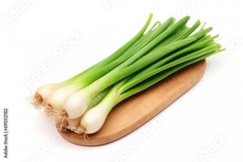 Fresh Green Onions On Wooden Kitchen Board Isolated On White Backgroung. Сoncept Food Photography, Fresh Ingredients, Culinary Art, Farm To Table, Healthy Eating