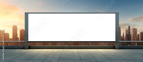 Advertising blank horizontal billboard in a city with skyline in the background copy space for your text message or media content, advertisement, commercial and marketing concept