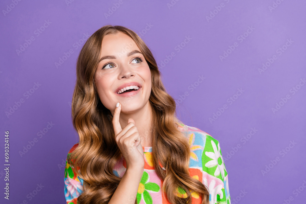 Portrait of curly hair lady touch cheek looking copy space good news announcement black friday deals isolated on purple color background Portrait of curly hair lady touch cheek looking copy space good news announcement black friday deals isolated on purple color background