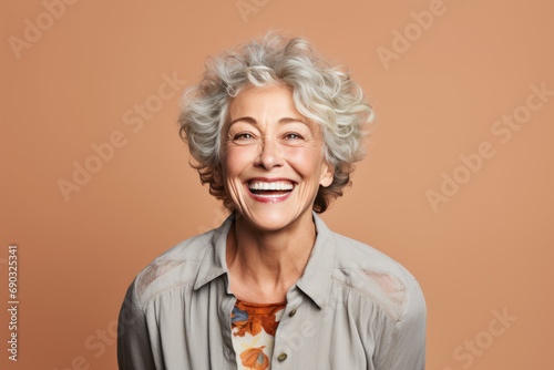 Elderly Caucasian woman Mature and happy They have smiling and joyful expressions in the studio photo. © เลิศลักษณ์ ทิพชัย