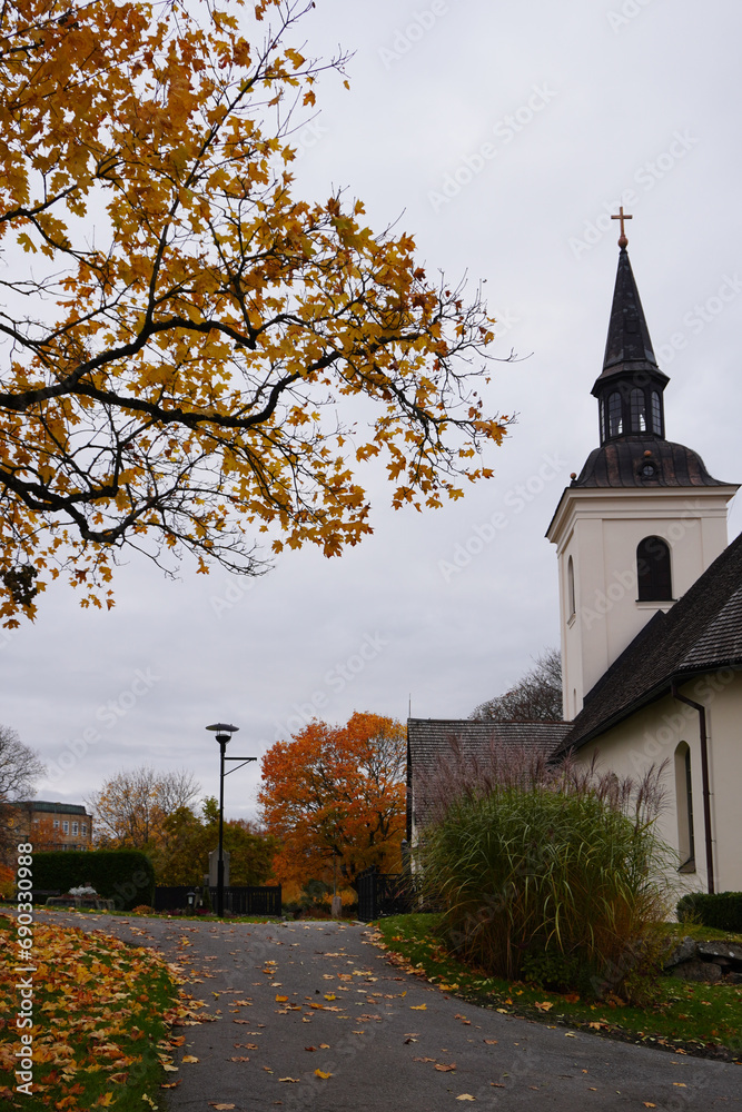 View of a church during autumn View of a church during autumn