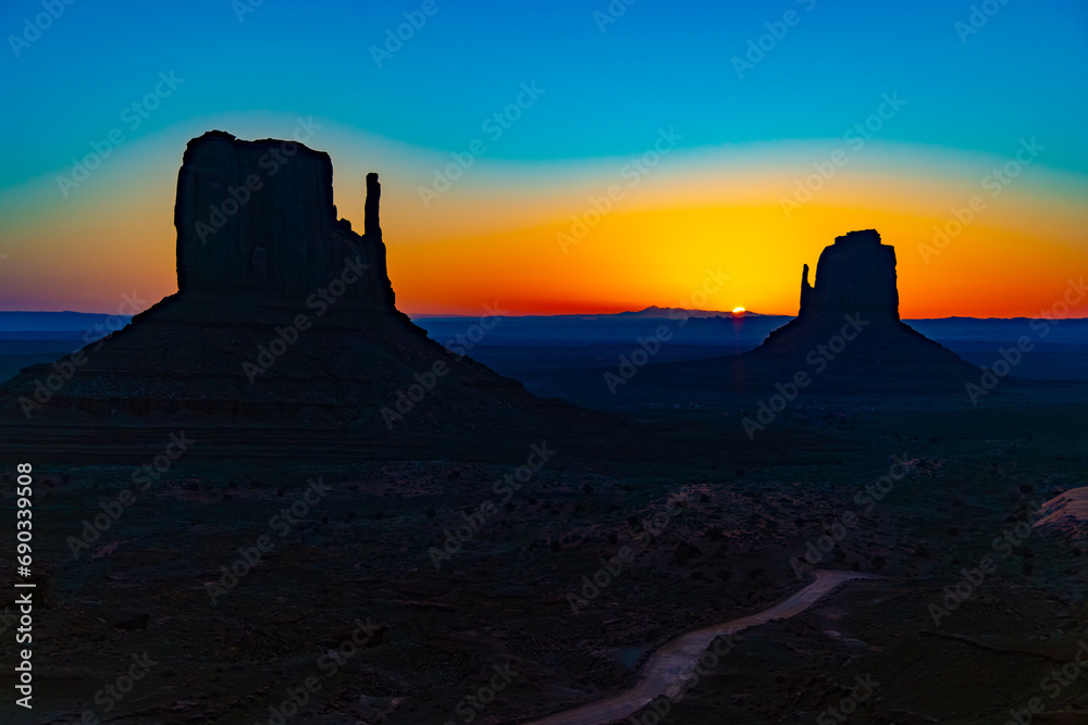Sunrise in Monument Valley, East & West Mittens