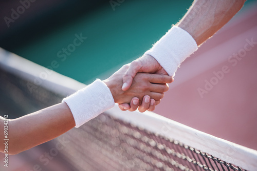 Couple playing tennis