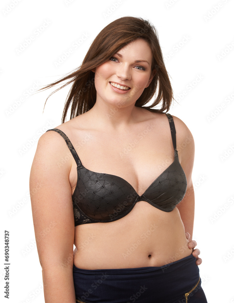 Obraz premium Portrait, smile and bra with a plus size woman in studio isolated on a white background for body positivity. Beauty, wind and a happy young model looking natural or confident in her underwear