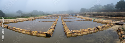 The Salinas de Iptuci, an operating 3000 year old Roman salt farm photo