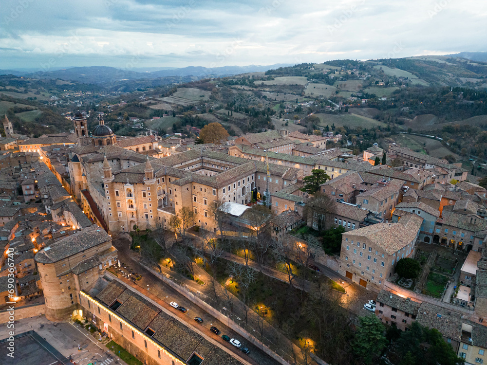 Obraz premium Italy, 08 December 2023 - aerial view at dawn of the medieval village of Urbino in the province of Pesaro and Urbino, a UNESCO heritage site