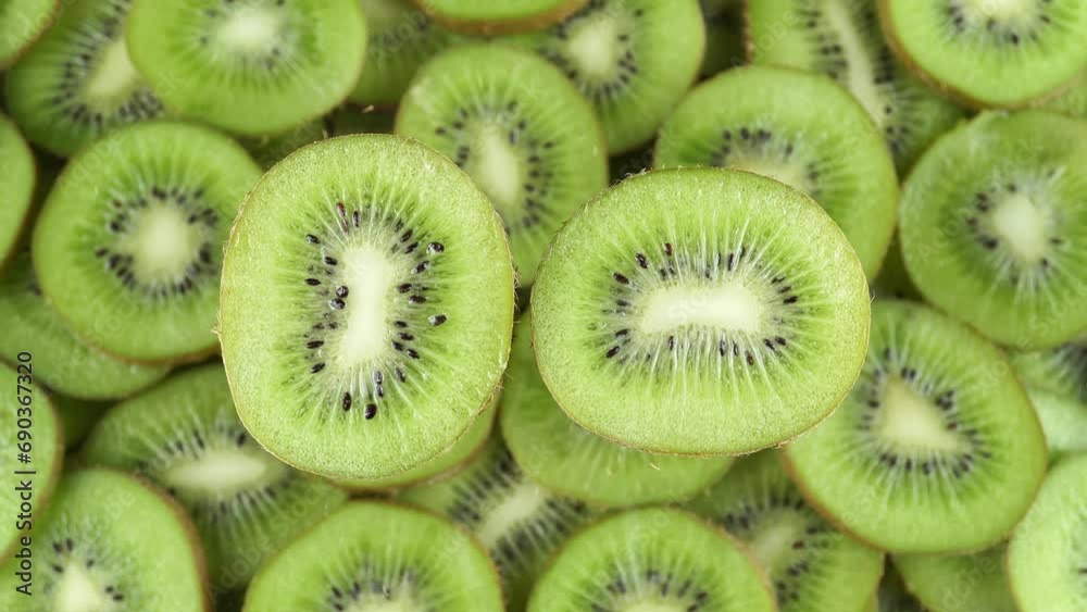 Rotating Tropical Kiwi on a Background. Rotating Tropical Kiwi on a Background.