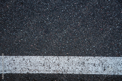 Surface grunge rough of asphalt. Tarmac dark grey grainy road. Texture Background Top view close up