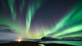 Aurora borealis or northern lights with starry glowing in the night sky . Night landscape. 