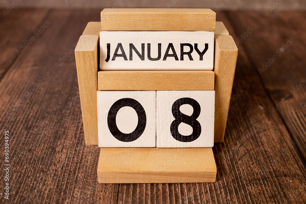 Calendar on January with the date 08th, 08 number on wooden, shape wood Calendar on January with the date 08th, 08 number on wooden, shape wood