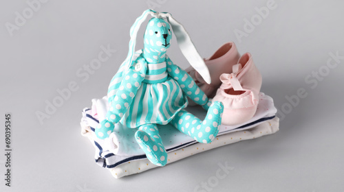 Stack of baby clothes, bunn...