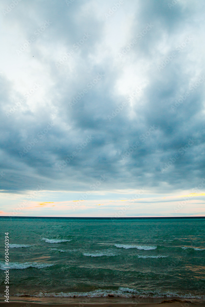 Dramatic Overcast Sky Over Tranquil Lake Michigan Shoreline