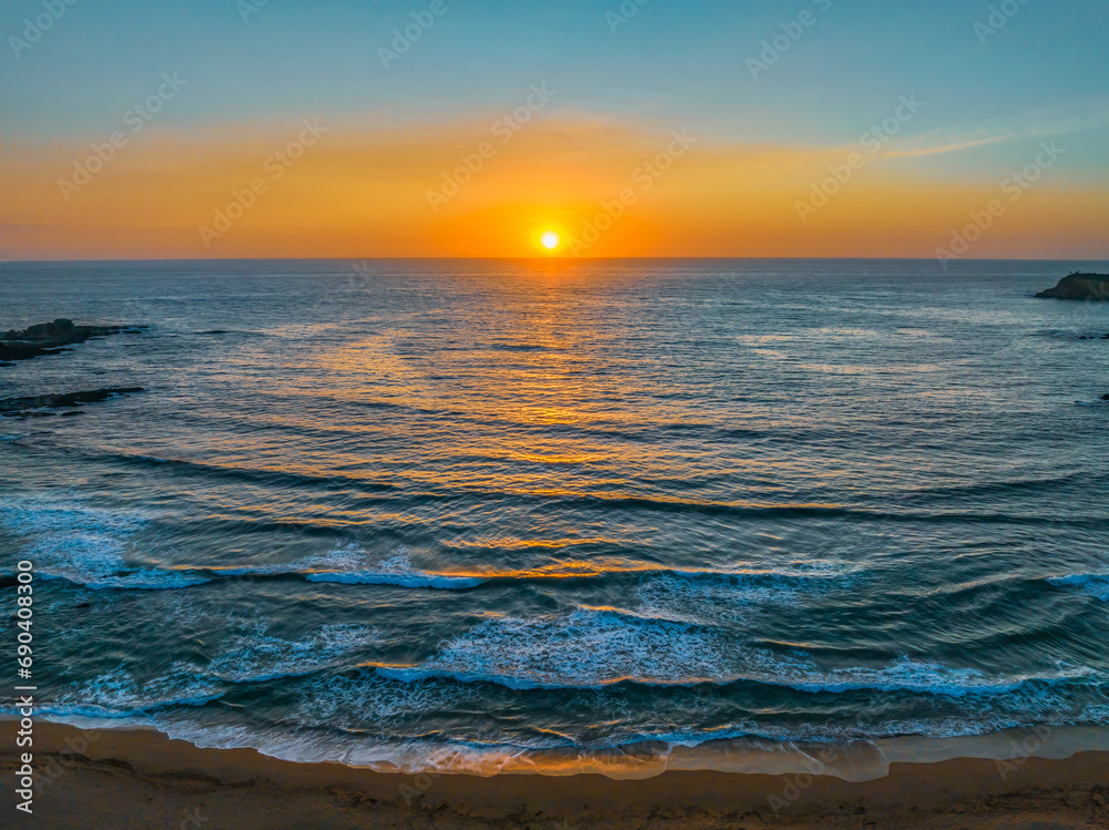 Fototapeta premium Sunrise seascape with high clouds