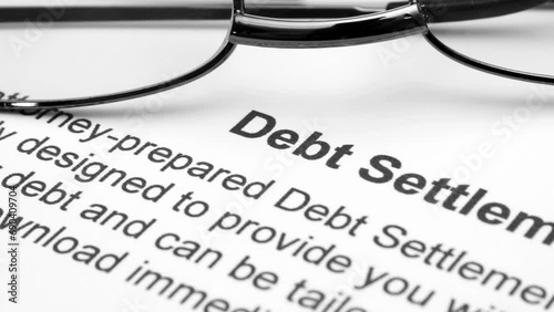Close up of debt settlement dolly shot photo