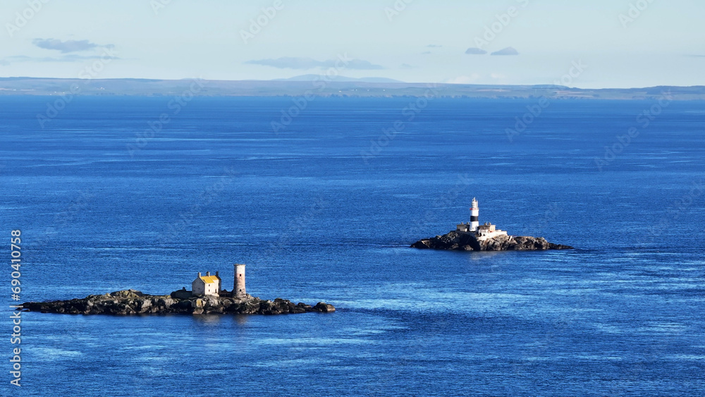 Aerial view of The Maidens lighthouses in the Irish Sea County Antrim between N Ireland and Scotland
