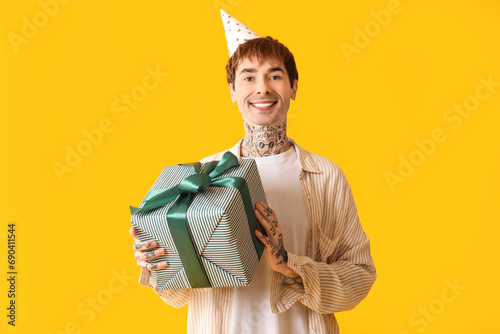 Happy young man in party ha...
