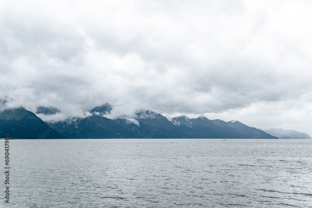Mountains Surrounding Sea in Kenai Fjords National Park in Seward, AK Mountains Surrounding Sea in Kenai Fjords National Park in Seward, AK