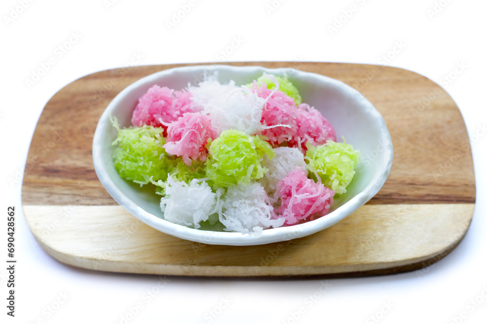 Sweet coconut balls, crispy coconut candies (Maprao Gaew). Thai traditional dessert Sweet coconut balls, crispy coconut candies (Maprao Gaew). Thai traditional dessert