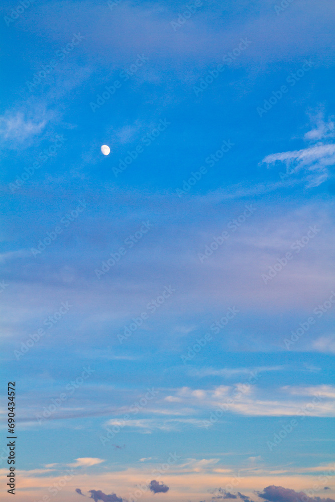Tranquil Sky Scene Vertical with Moon and Colorful Clouds