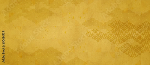 日本伝統の金の和紙素材に雲の和柄模様のワイド背景素材 photo