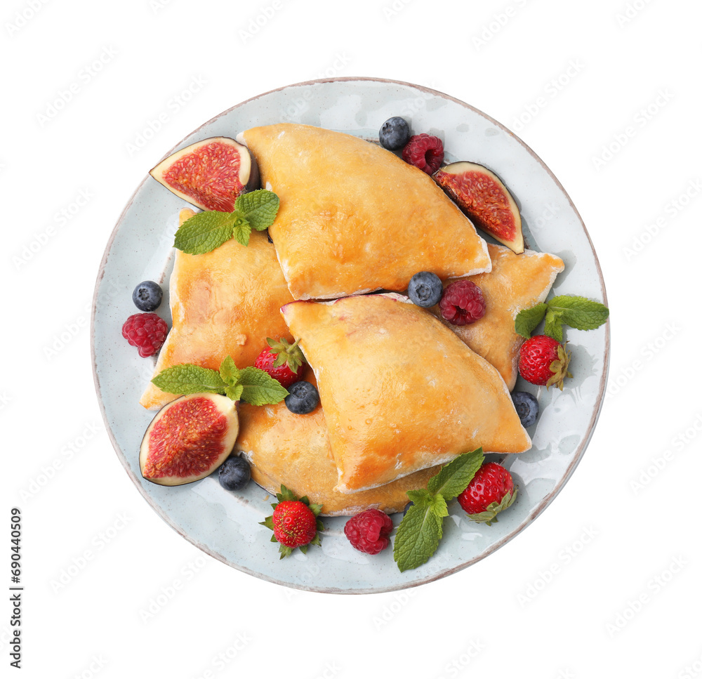 Delicious samosas with figs and berries isolated on white, top view Delicious samosas with figs and berries isolated on white, top view