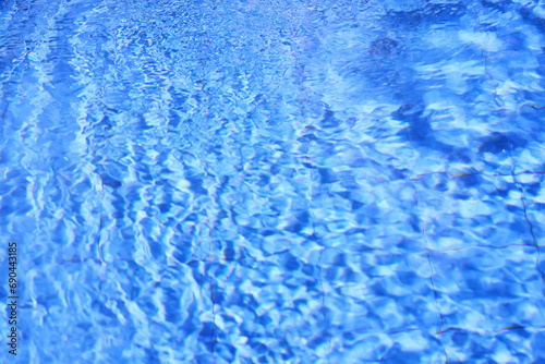 texture of transparent clear water in the pool blue abstract background