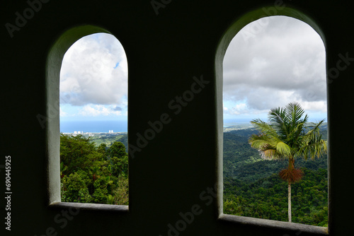 View through open windows at Yokahu Tower overlooking El Yunque Rainforest on the island of Puerto Rico, the only tropical rain forest in the United States National Forest System.