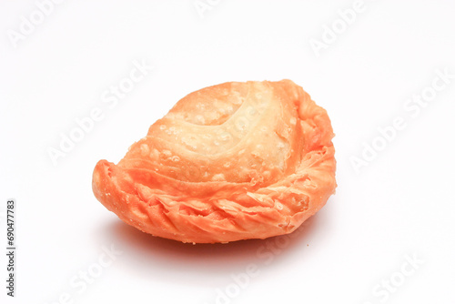 Fried flour snack or curry puff filled with chicken, a popular snack in Thailand. placed on a white background