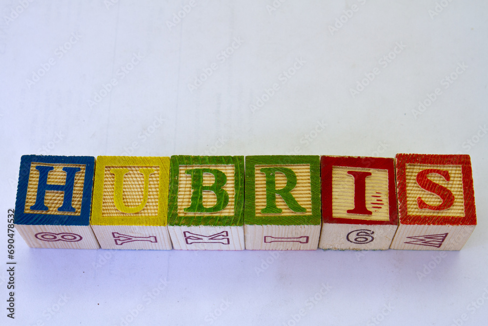 The term hubris displayed visually on a clear background with copy space The term hubris displayed visually on a clear background with copy space