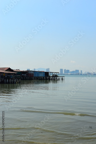 Penang, Malaysia - August 10 2023 - Chew Jetty (Clan Jetty) in Penang. Unesco World Heritage Site in Penang, Malaysia. It’s a unique scenic that combines resident home stay with tourism. © Scotts Travel Photos