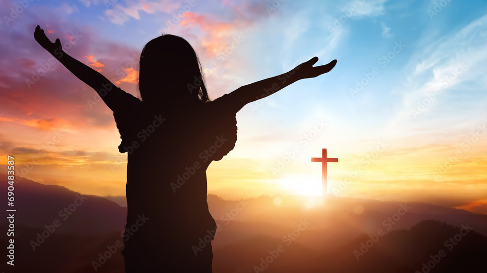 Human hands open palm up worship on cross sunset background.