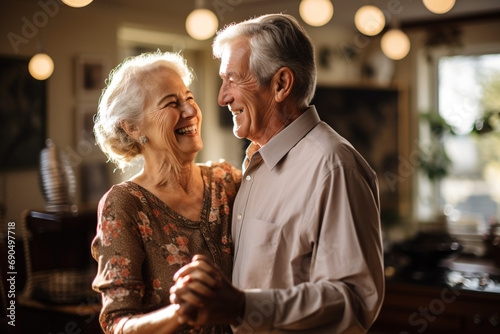 Aged people still in love romantic moment concept. Two cheerful lovely sweet tender beautiful adorable cute romantic grey-haired married senior spouses husband wife hugging each other while dancing