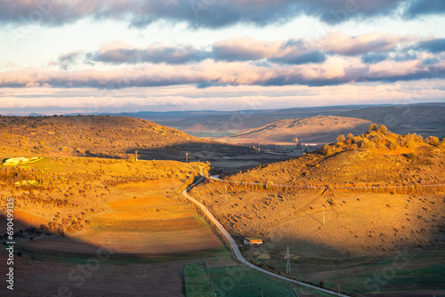 A road that runs through the mountains surrounding the medieval town of Siguenza, Castile-La Mancha. photo